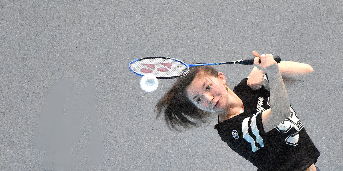 A Girl Playing Badminton